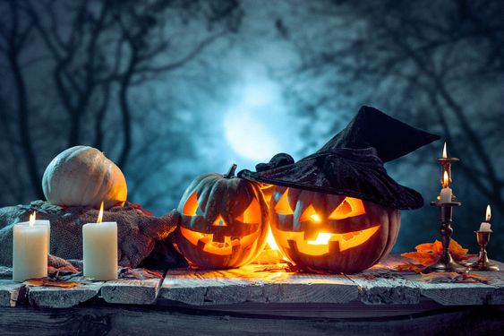 Halloween pumpkins on blue background