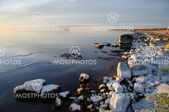 Coastal view with contrasting colors and smooth water