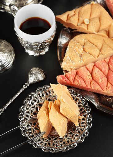 Traditional Turkish coffee and Turkish delight. creative...
