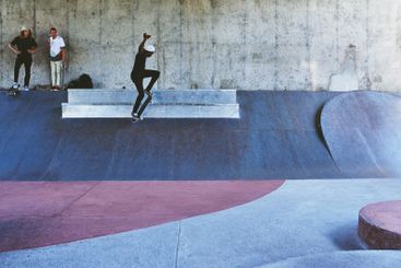 Jump, skateboard and ramp with man at park for urban,...