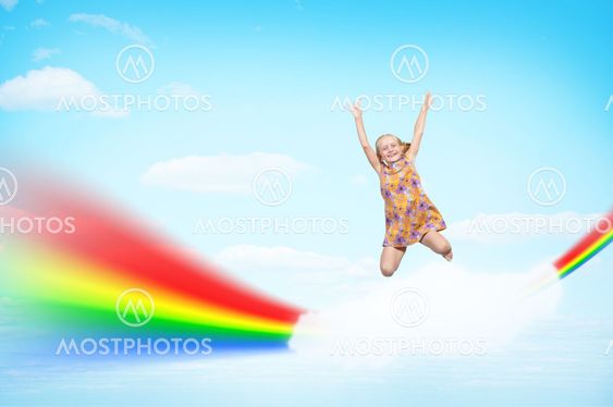 girl jumping on clouds and a rainbow