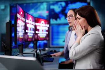 Professional cybersecurity analyst preventing ransomware...