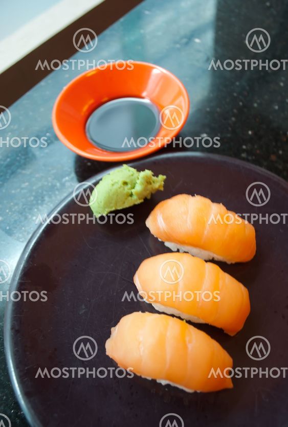 salmon nigiri sushi with wasabi and soy sauce