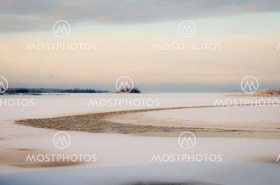 Frozen sea with open water