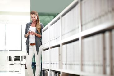 Business, cellphone and woman in office, internet and...