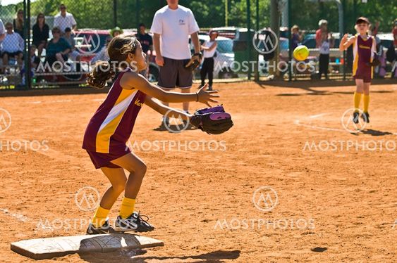 Girl's Softball Throw to First