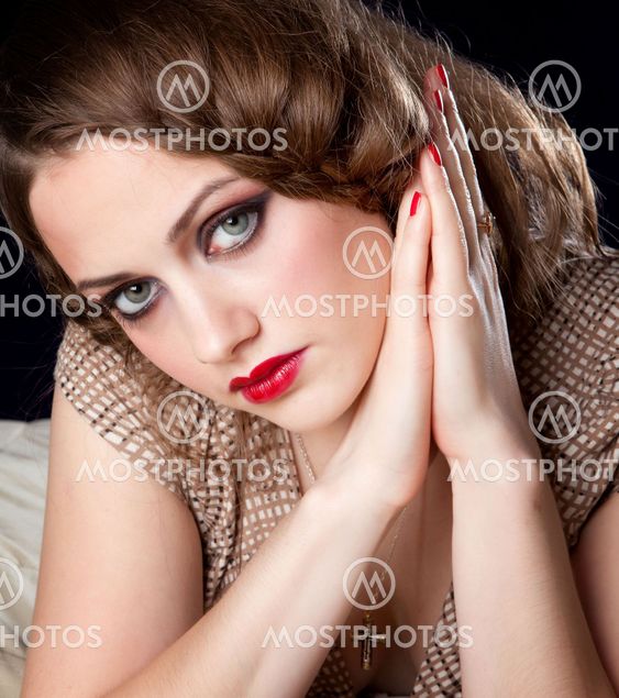 Portrait of young woman with big eyes