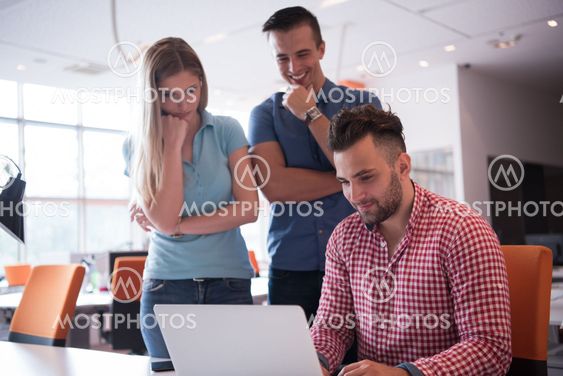 Group of young people employee workers with computer