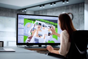 Female architect using 3D software