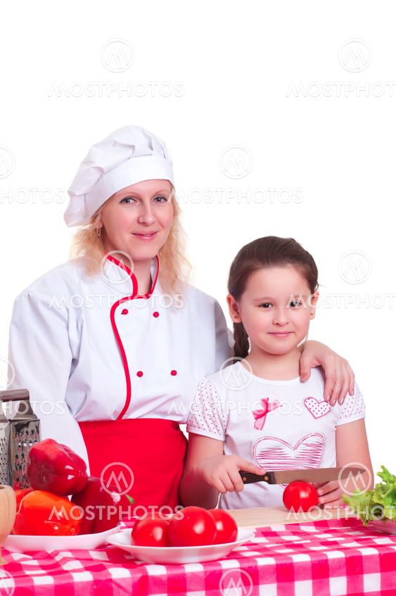 Mother and daughter cooking dinner