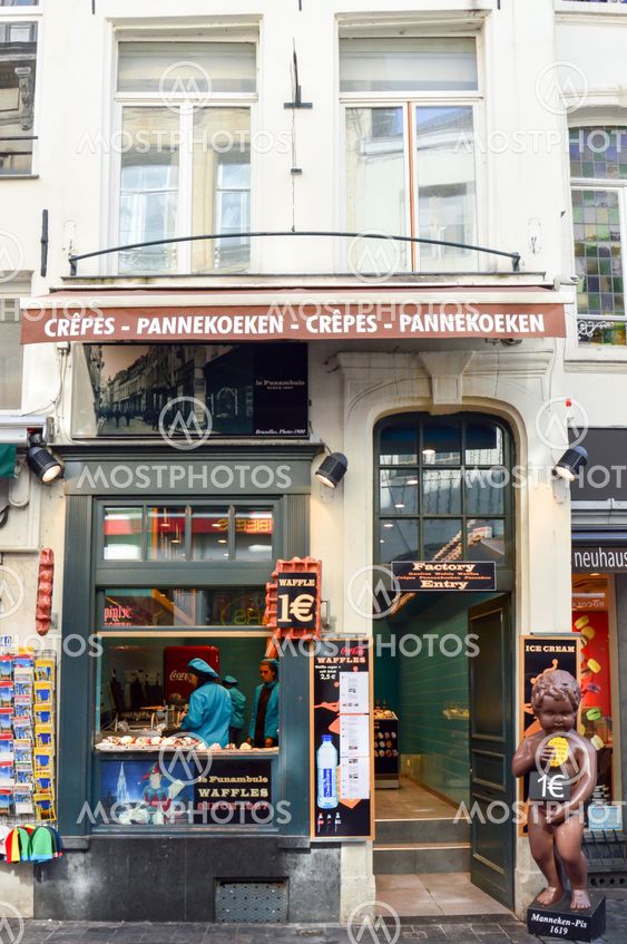 Brussels, Belgium - April 2015: Le Funambule, famous homemade waffle shop located at Grand Place next to Manneken Pis landmark in Brussels, Belgium