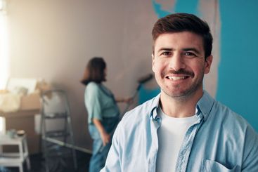 Couple, painting and portrait of man in home for...
