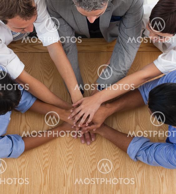 Close-up of an International business team with hands together