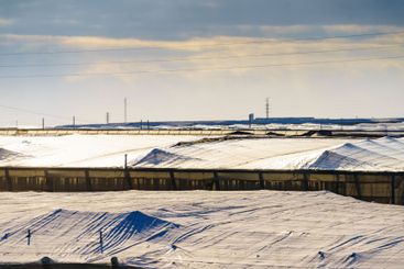 Plastic greenhouses on coast, Spain