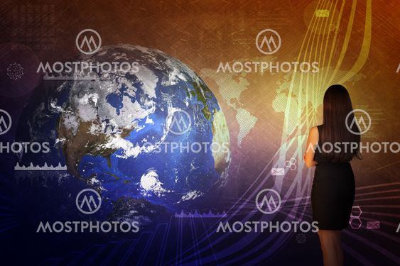 Businesswoman in front of world map