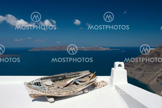 Old rowing boat on the roof