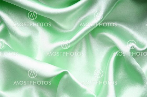 Smooth elegant green silk as background