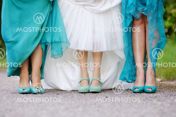 Bride and bridesmaids show off their shoes