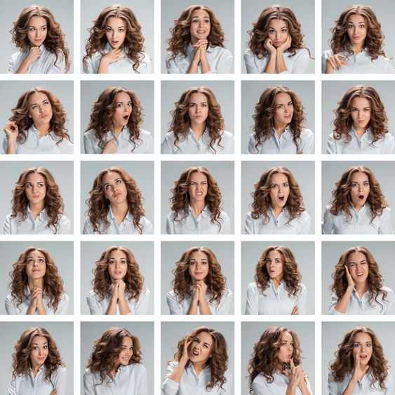 The collage from different woman emotions on gray...
