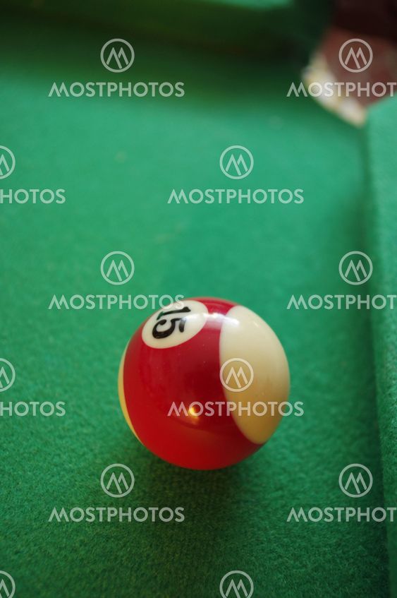 fifteen ball on green billiards table.