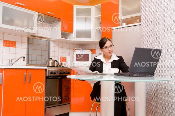 businesswoman in kitchen