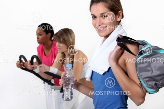 female trio in fitness center