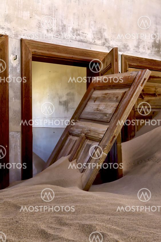 ruin full of sand at kolmanskop ghost house near luderitz namibia