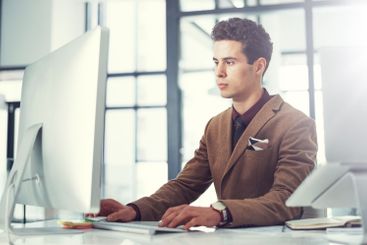 Reading, computer and planning with business man in...