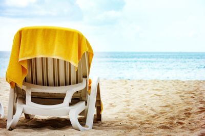 Vacation concept with chaise longue