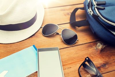 close up of gadgets and traveler personal stuff