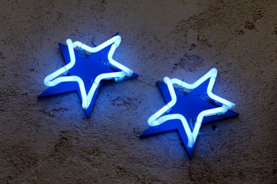 neon stars from hotel sign, france