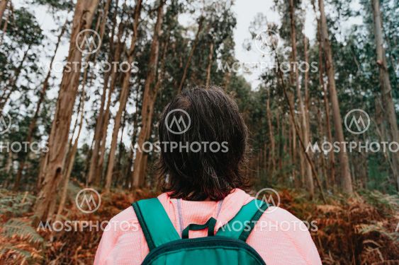 Super close up of the back of an old woman in front of a...