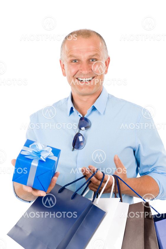 Mature smilling man hold shopping bags