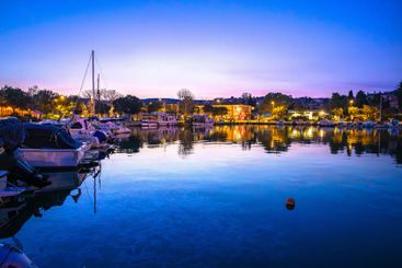 Colorful dusk harbor view in town of Krk