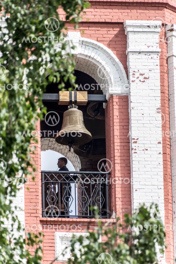 The City Of Birsk. The bell ringer in the belfry of Holy...
