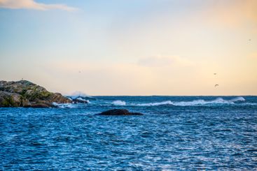 Rough seas against rocks.