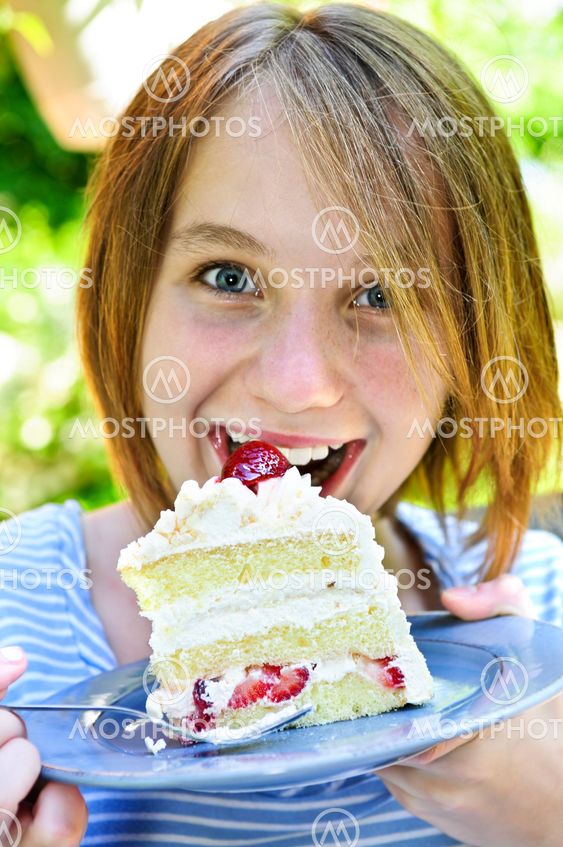 Girl eating a cake