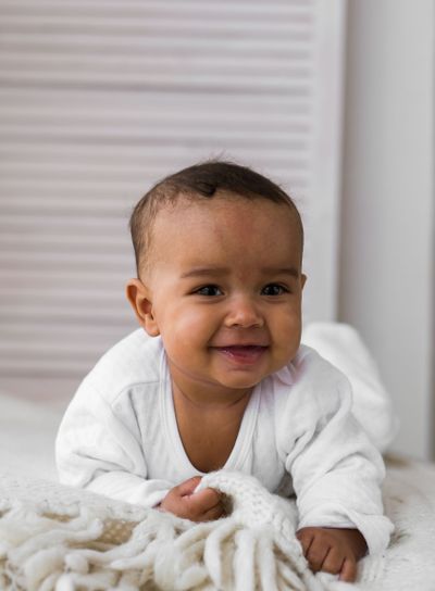 Adorable little african american baby boy looking - Black...