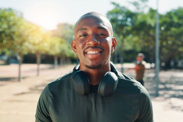 Outdoor, man and smile in portrait for fitness, running...
