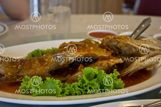 fried grouper topped with sweet ,sour and hot sauce
