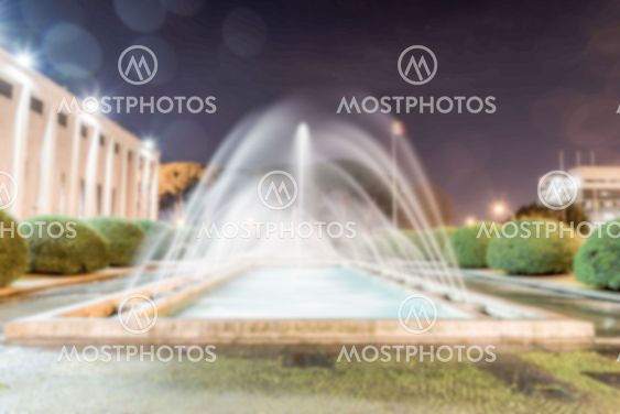Defocused background of neoclassical fountain in Rome, Italy