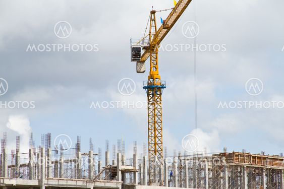 Construction site with crane and building