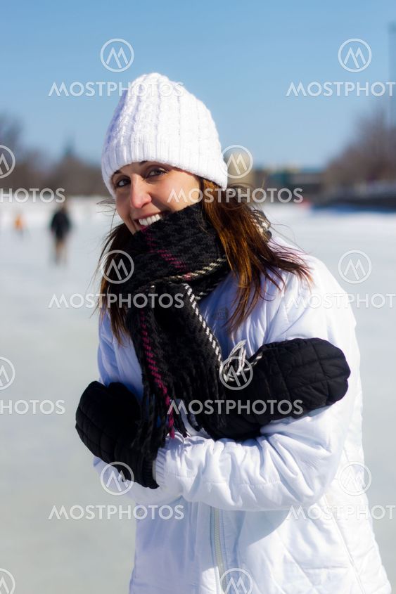 Young woman is cold because of the winter weather