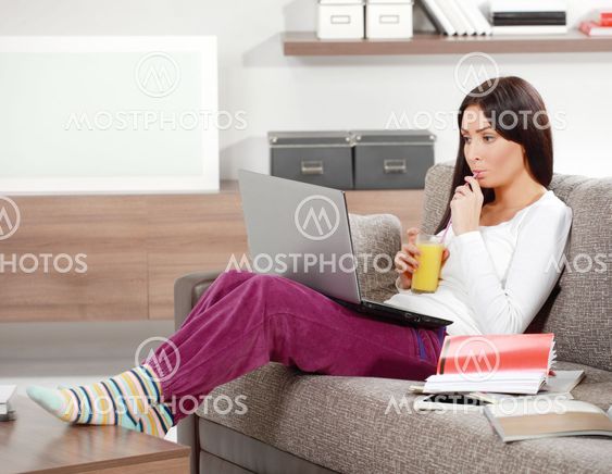 Young woman drinking fresh juice