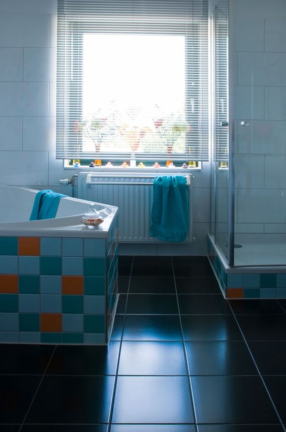 Colorful white bathroom with black floor