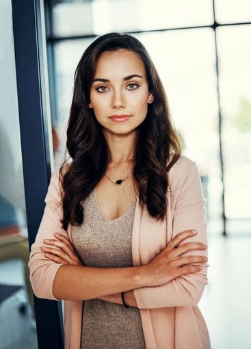 Office, professional and portrait of woman with crossed...