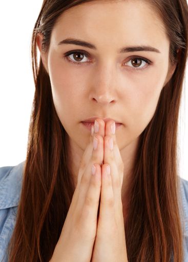 Woman, portrait and praying christian in studio for...