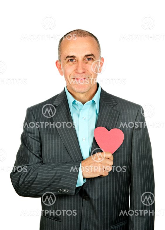 Man with paper heart on white background