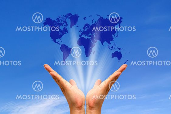Human hands holding map world