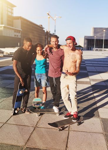 People, group and skateboard for fitness in city of...